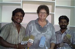 Linda with painters after painting the front room